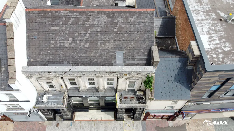 Aerial drone roof inspection photograph of a Barclays Bank branch in Merthyr Tydfil town centre