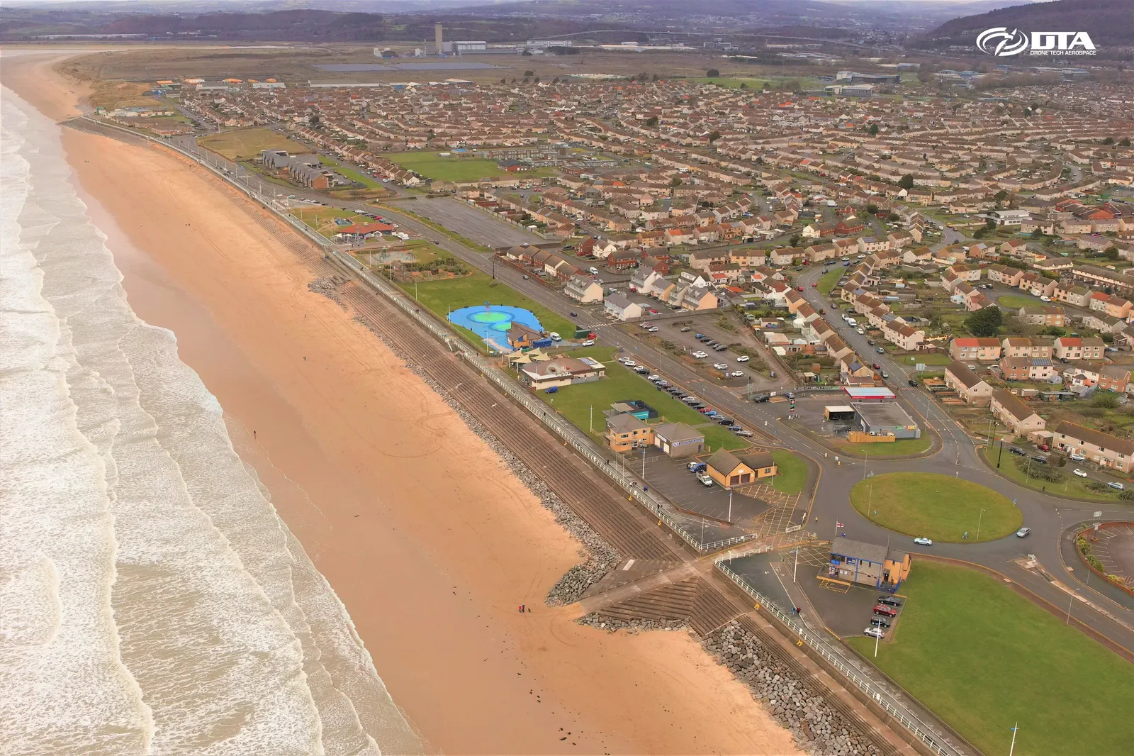 Aerial photograph of a coastal seafront and promenade at Aberavon, Port Talbot.