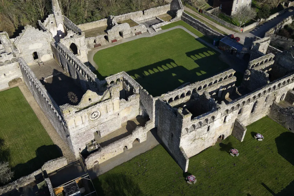 Aerial photograph of the palace's great hall ruins and surrounding walled precinct.