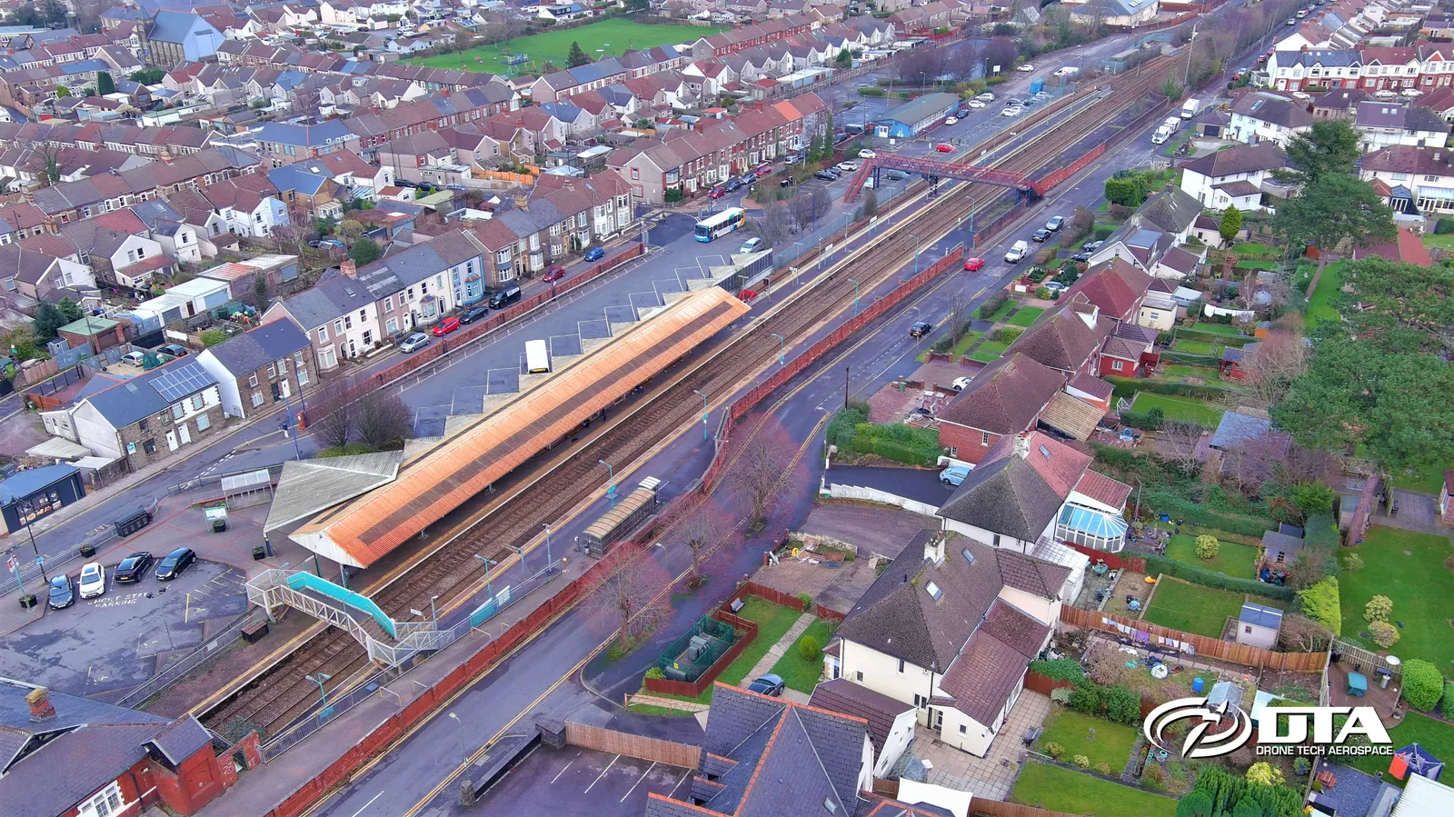 Aerial photograph looking down on a railway station platform and canopy at Caerphilly.