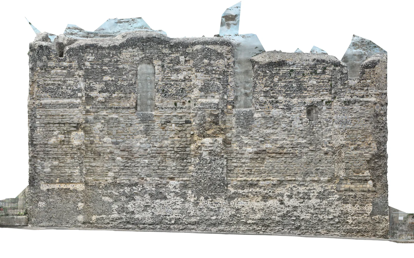 Flat, front-on orthographic image of a tall ruined flint and stone wall showing every course of masonry and the arched openings without perspective.