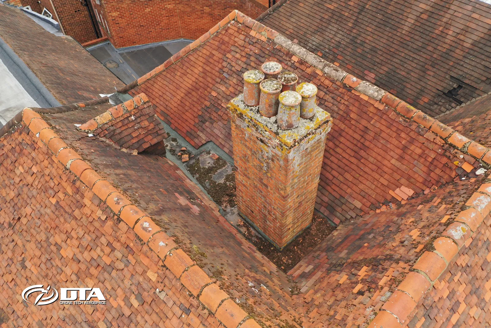 Aerial photograph looking down on a commercial building roof in Cirencester.