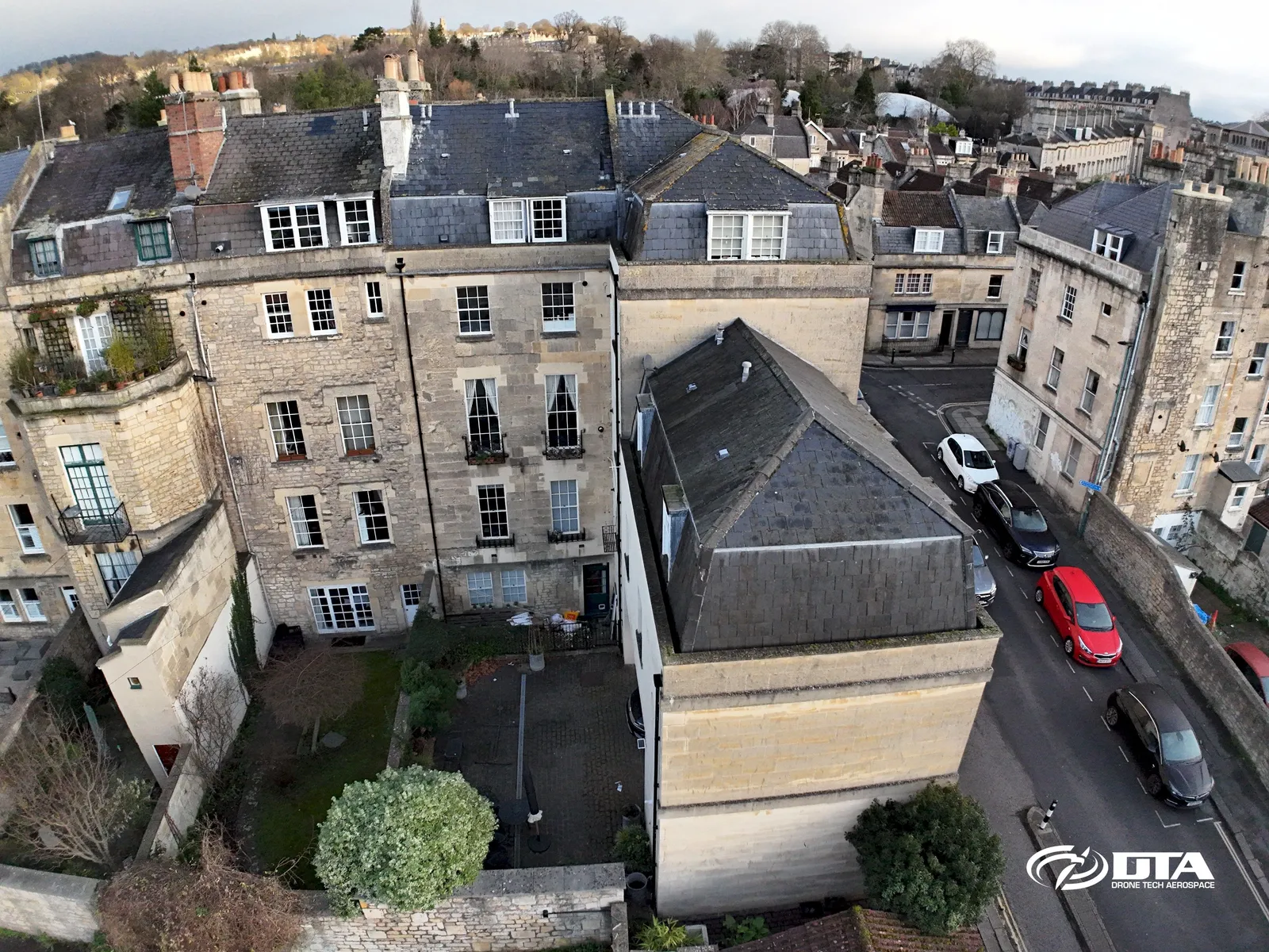 Aerial photograph of the rear elevation and roof of a terraced building in Bath.