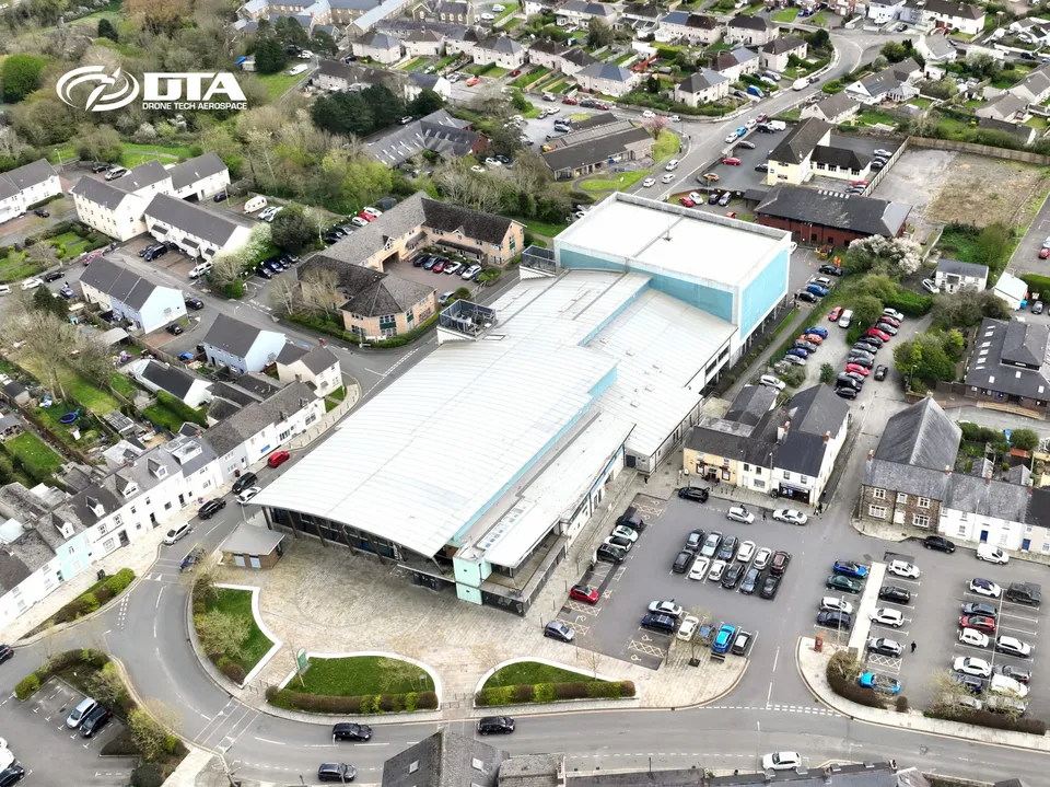 Aerial photograph of a leisure centre building and car park at Haverfordwest.
