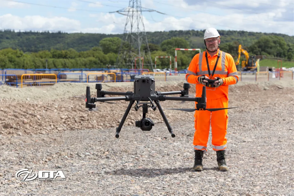 Aerial photograph of an HS2 construction site with earthworks and access roads, captured for a topographical survey.