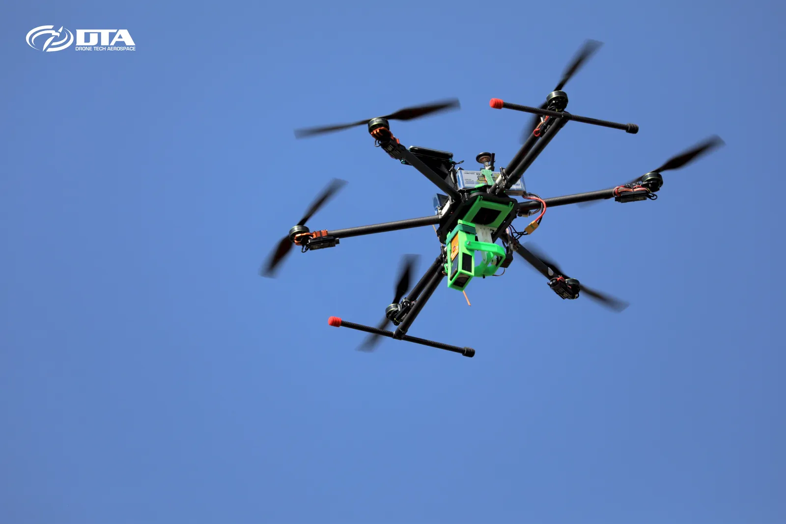 Aerial photograph of an open site captured during a gas-measurement drone flight.