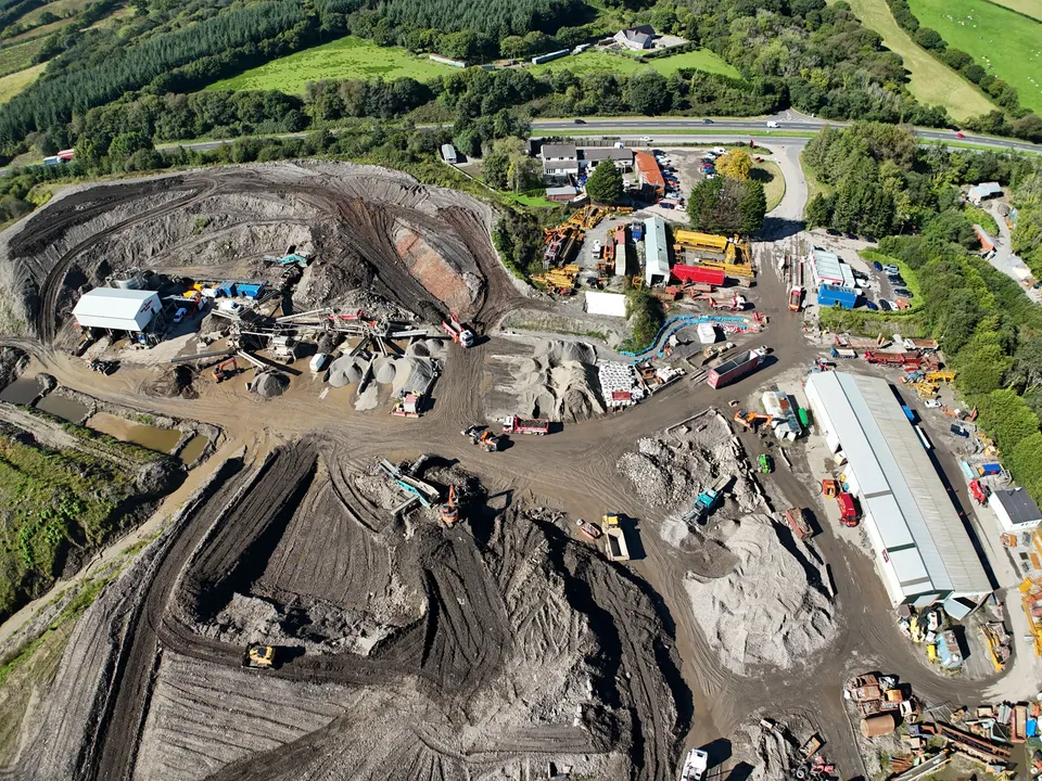 Aerial overview photograph of a farm construction site at Cwmgwili with buildings and access tracks.