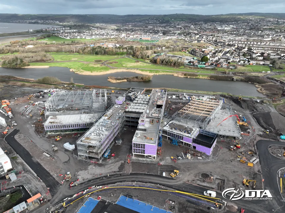 Aerial photograph of a large construction site at Pentre Awel with groundworks and site compounds visible.