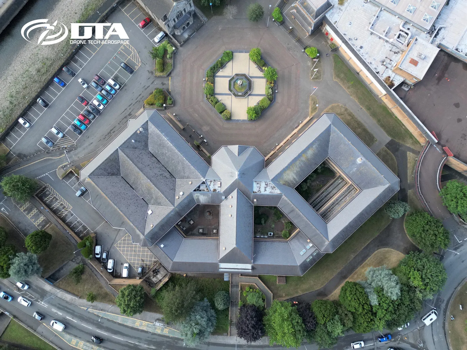 Aerial photograph looking down on the roof of a civic centre building in Port Talbot.