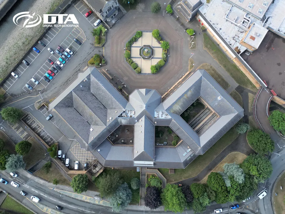 Aerial photograph looking down on the roof of a civic centre building in Port Talbot.