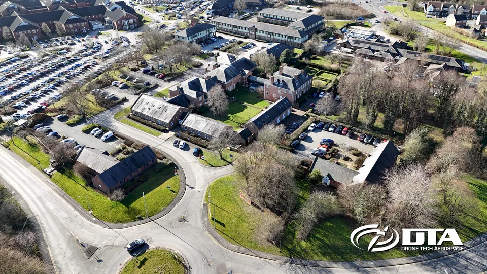 Aerial photograph looking down on a technology park with multiple industrial units.