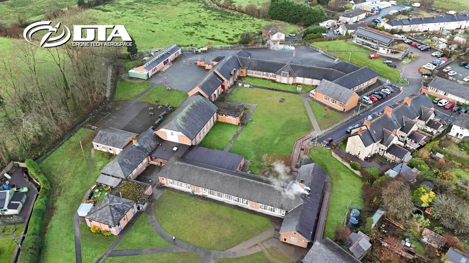 Aerial photograph of a school construction site at Machynlleth with new buildings taking shape.