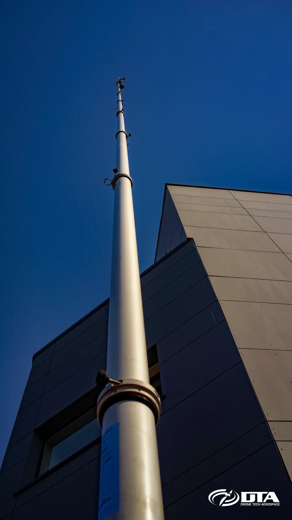 Elevated mast roof inspection where drone flight is restricted, Swansea