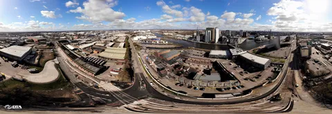 Wide aerial panorama of a 5.5 kilometre tramline construction site in Manchester