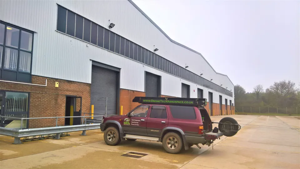 Aerial drone photograph of a large warehouse roof in Swindon during an external inspection